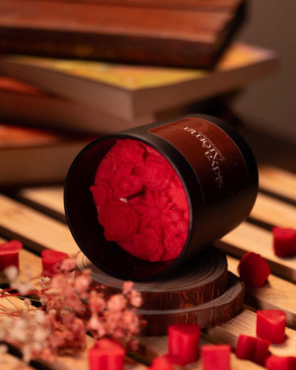Black jar with red floral detail
